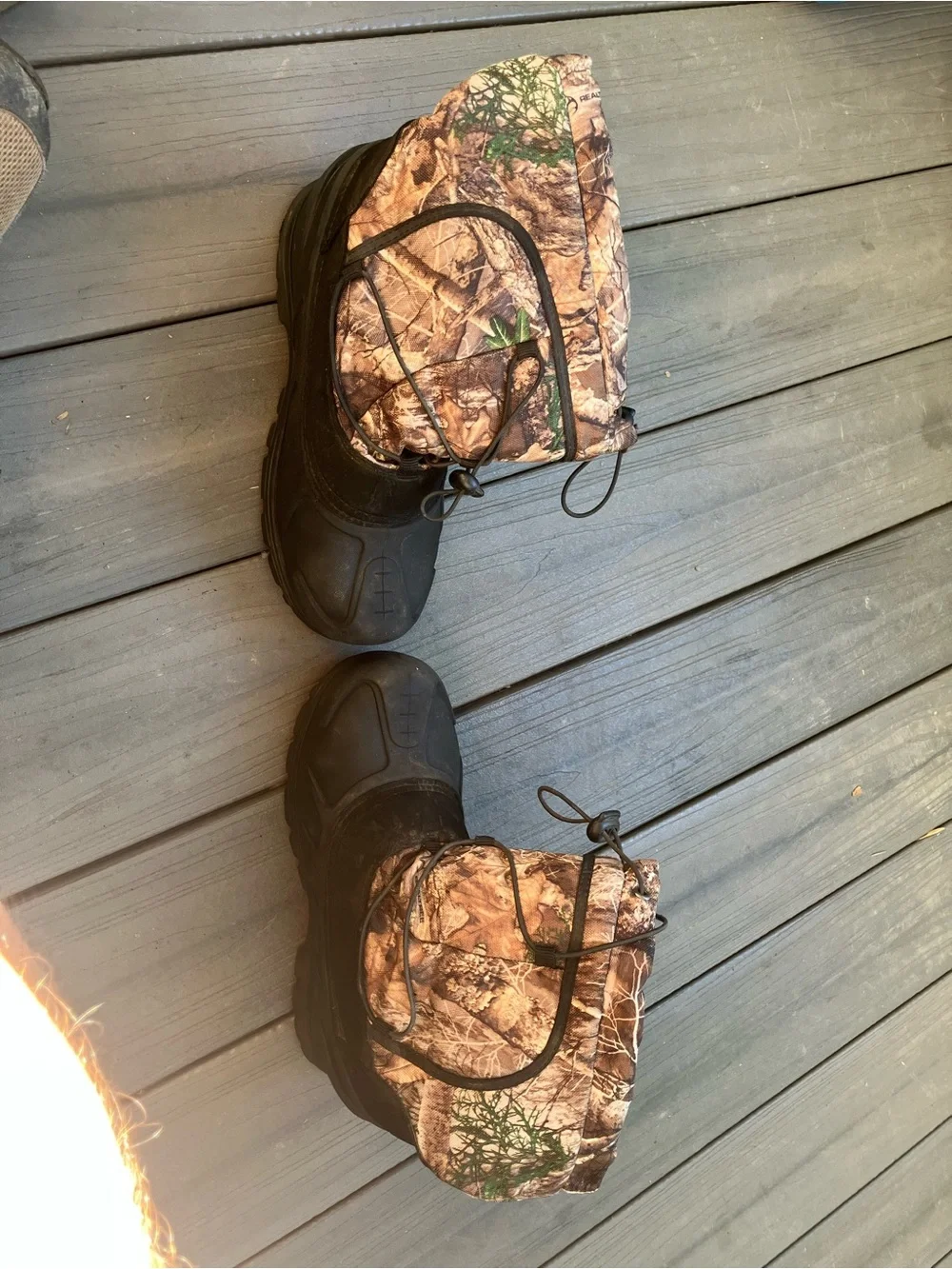 Kids Waterproof Winter Boots in Camouflage Brown. Some wear.